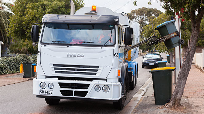 Truck collecting General Waste Bin