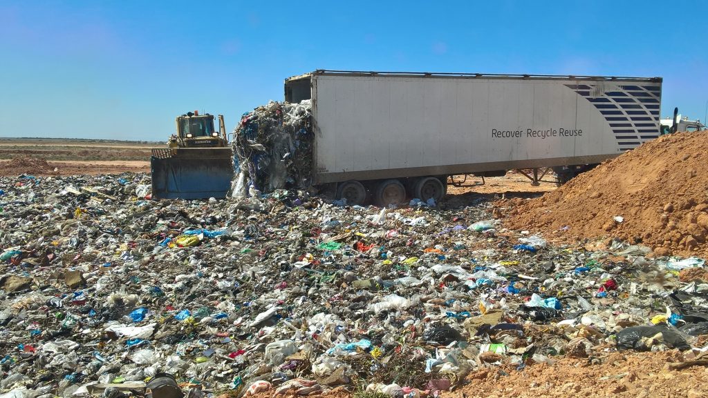 Landfill Site with a truck emptying rubbish